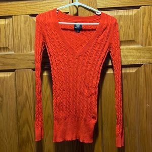 Red sweater knit, material size small in red